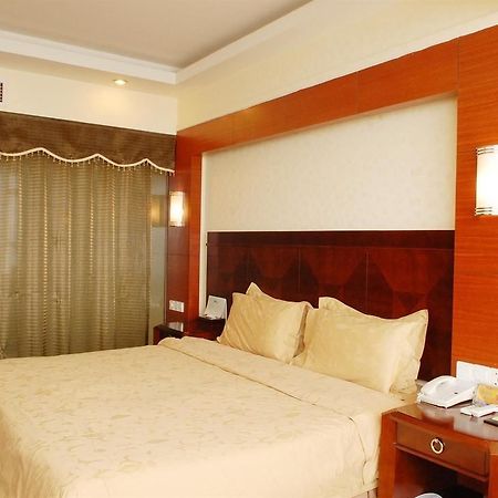 Jiujiang Futai 118 Hotel Rainbow Екстер'єр фото